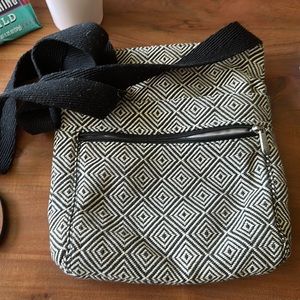 Thirty one over shoulder purse with pockets